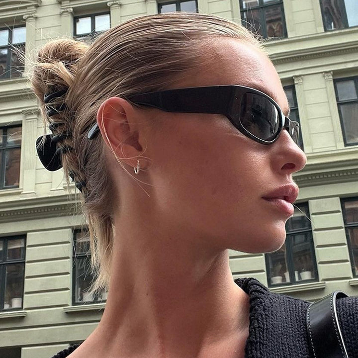 Women's sporty sunglasses with wide frame and UV protection Skanto