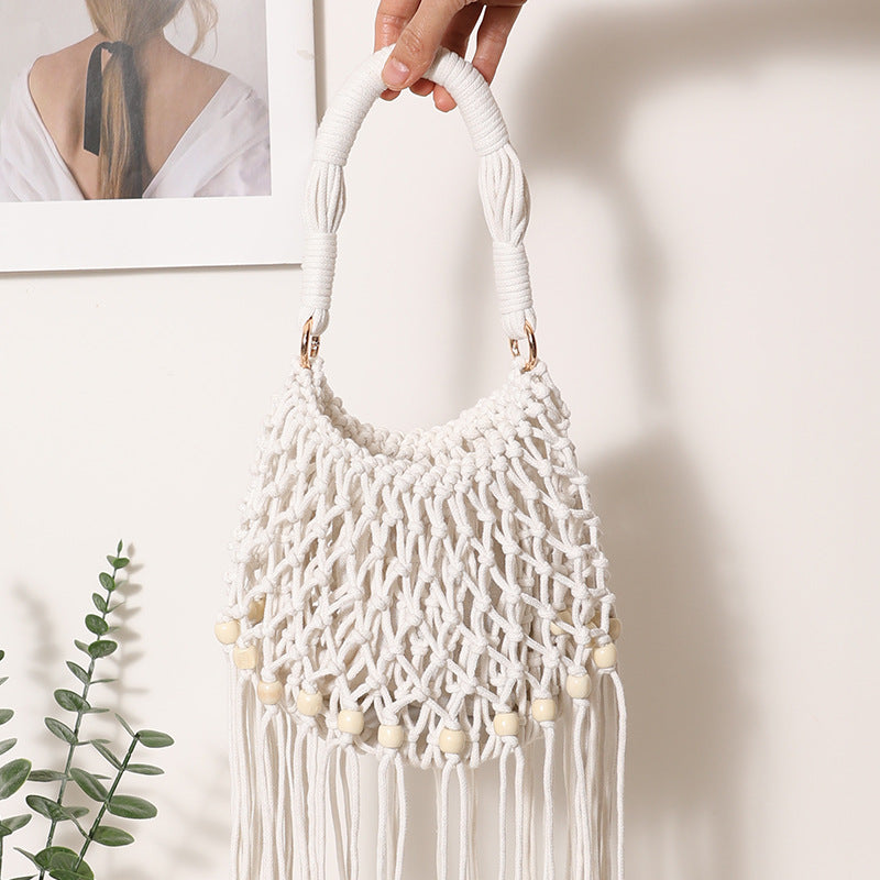 Macrame bag with decorative fringes and wooden beads Skanto
