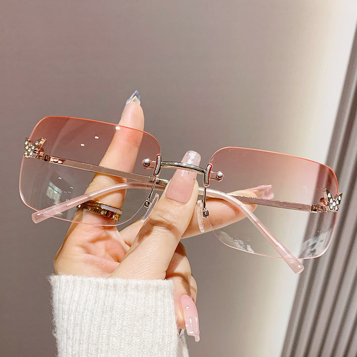 Dame elegant oversized solbriller med vevd gullramme Skanto