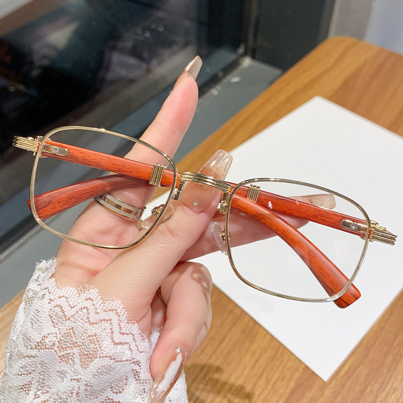 Dame solbrille med luksuriøs treinnfatning Skanto