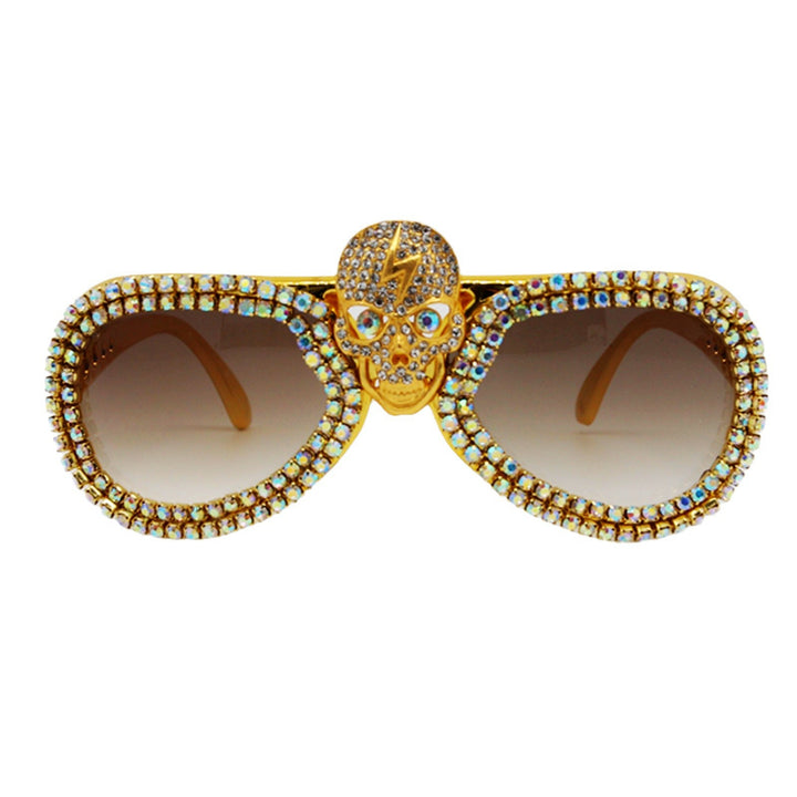 Dame statement-solbrille med uvanlig hodeskalle-design og glitrende strassramme Skanto