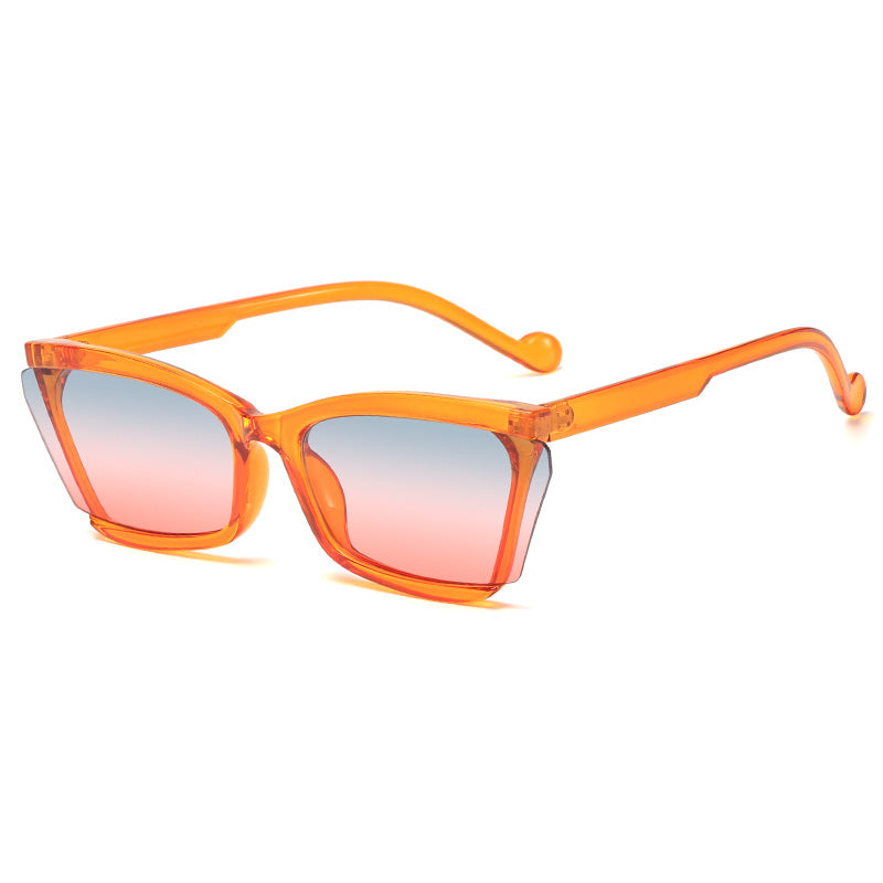 Dame moteriktig solbrille med unikt rektangulært design og UV-beskyttelse Skanto