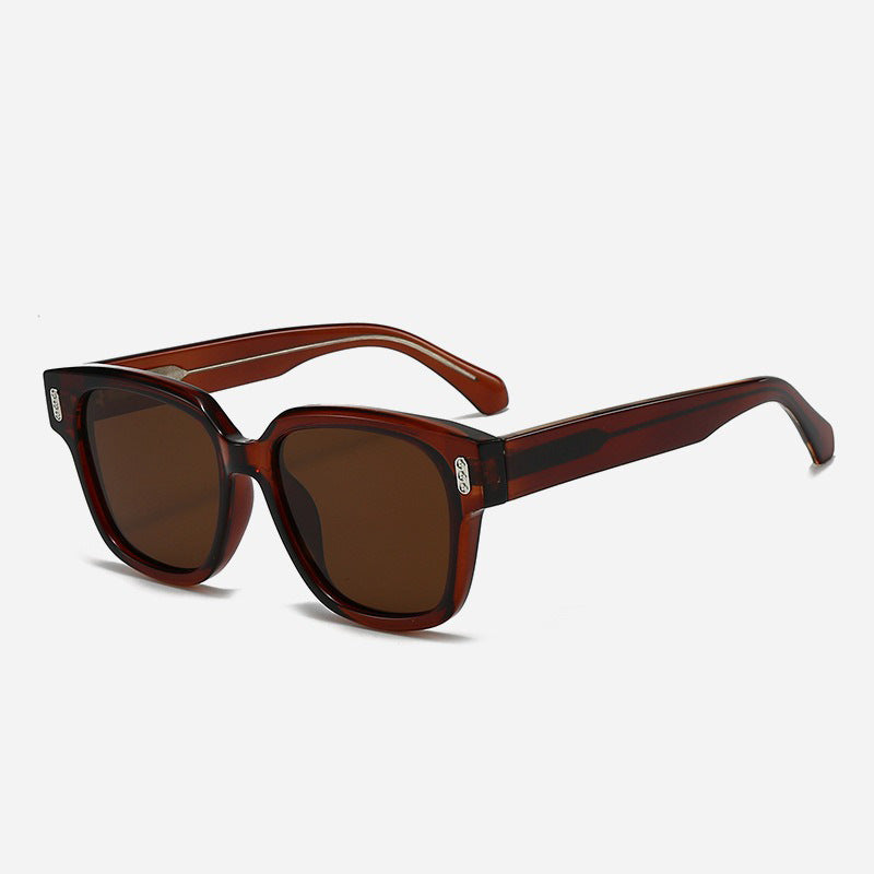 Dames designer solbriller med firkantet ramme og brune glass Skanto