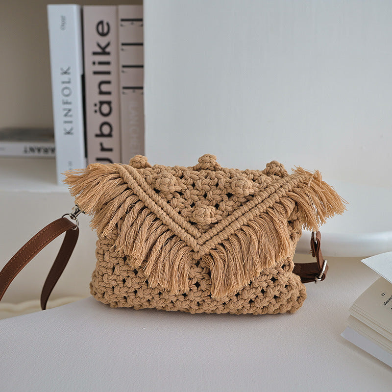 Handmade modern shoulder bag with fringe and decorative details Skanto