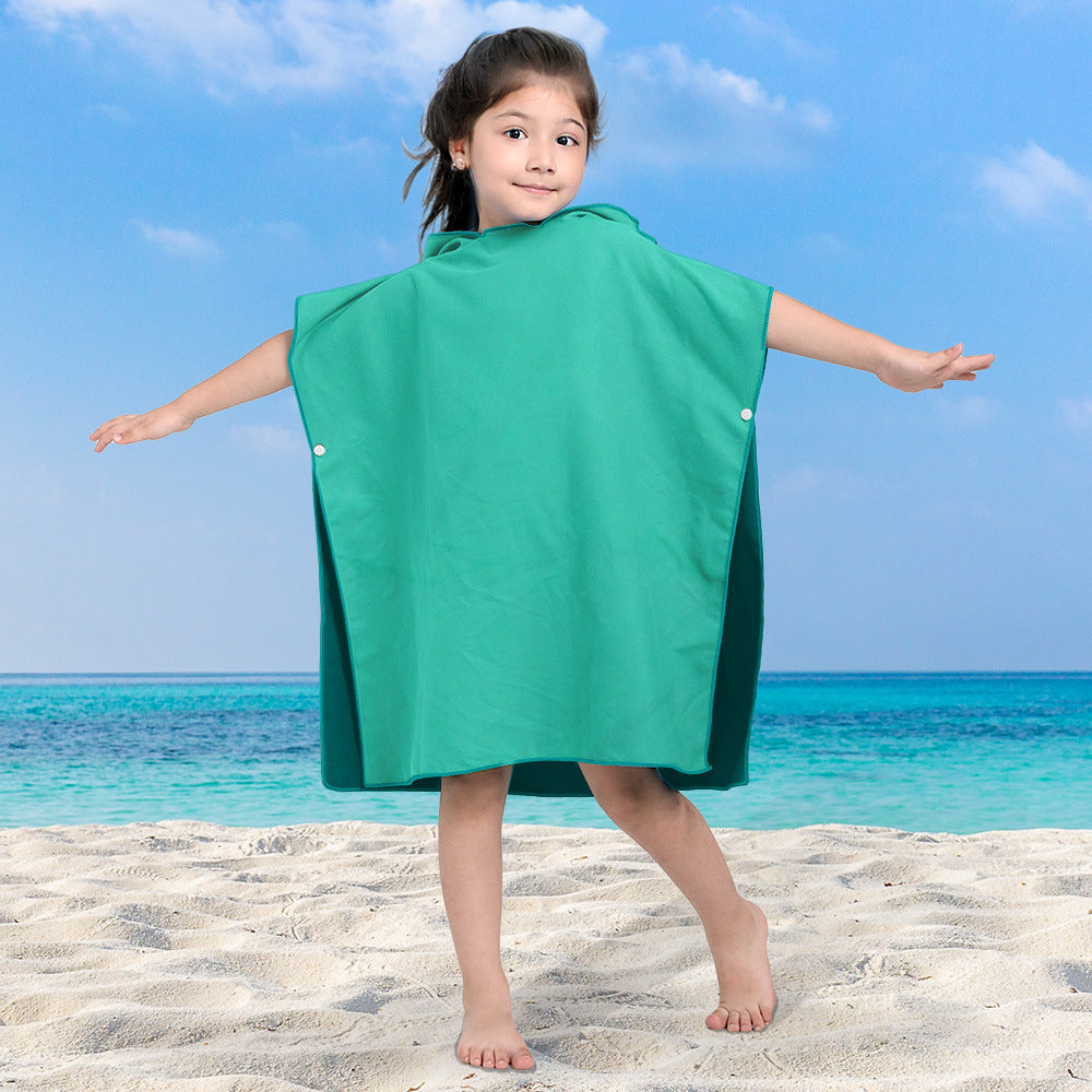 Jente badeponcho Skanto