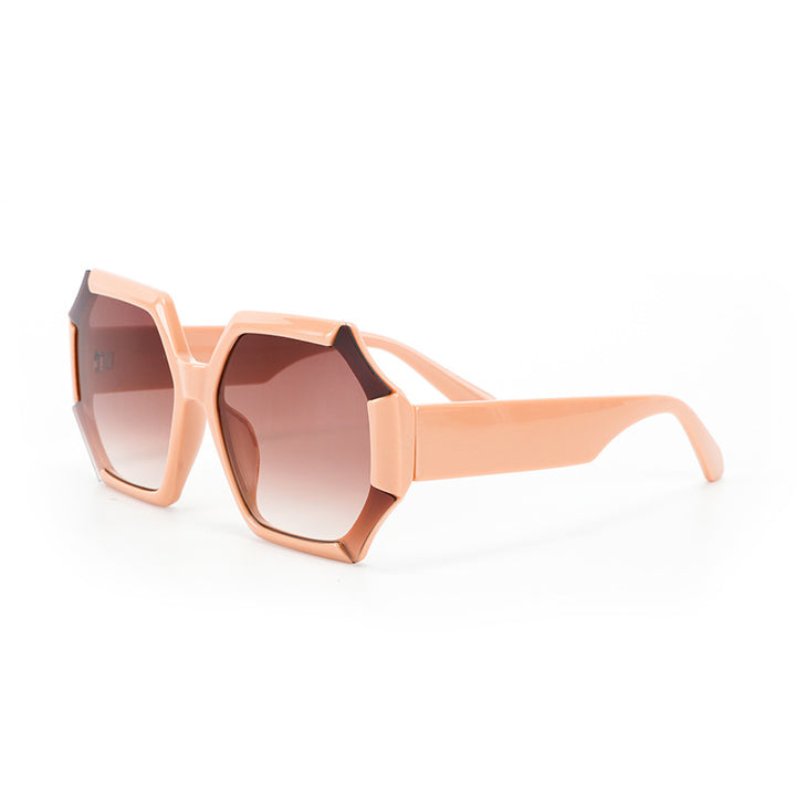 Dame moterelatert solbrille med fasettert ramme Skanto