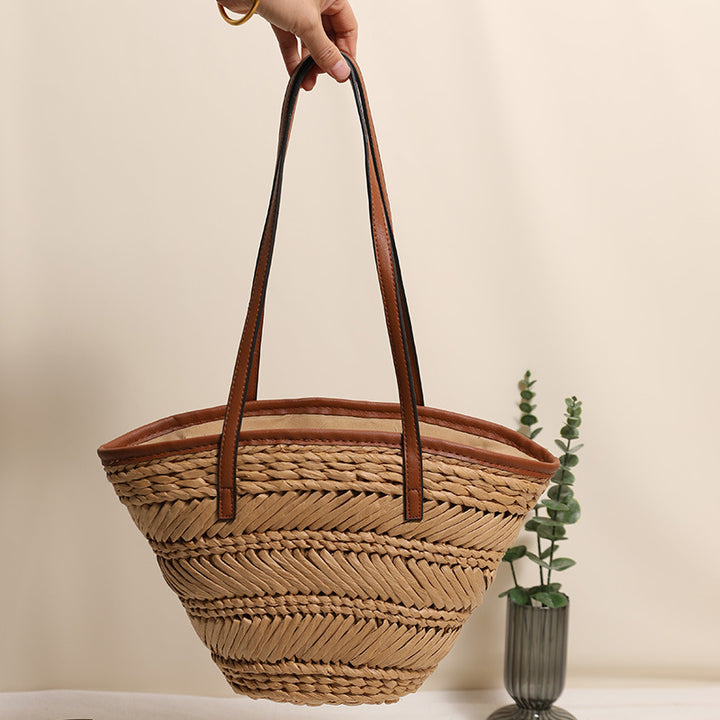 Braided basket bag with innovative leather handles Skanto