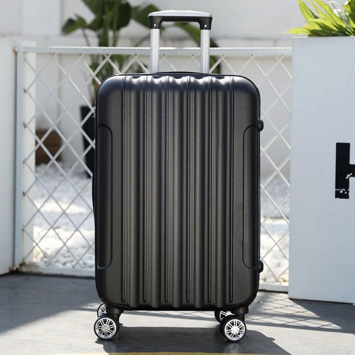 Hardsided suitcase with 360-degree rolling system and integrated safety feature Skanto
