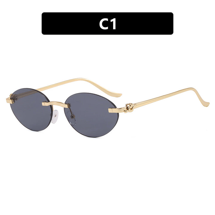Women's elegant oval sunglasses with gold accent Skanto