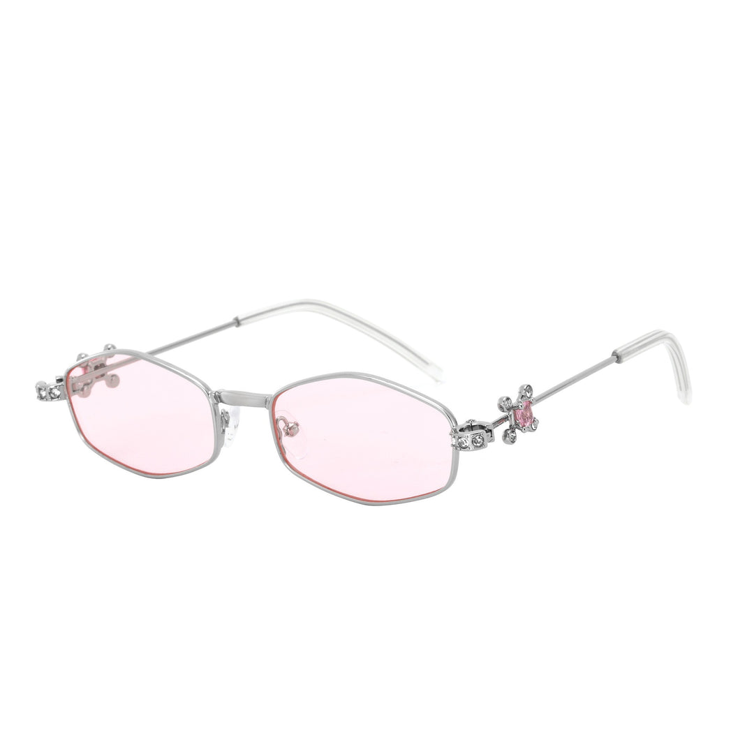 Dame Designer-solbrille med elegant smykkeinnramming Skanto