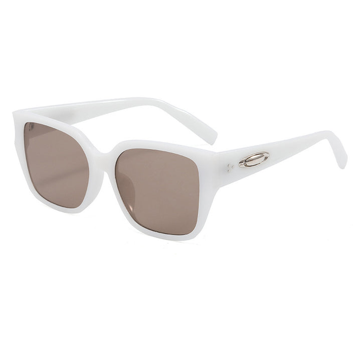 Dame solbrille i moderne kvadratisk design med klare linser Skanto