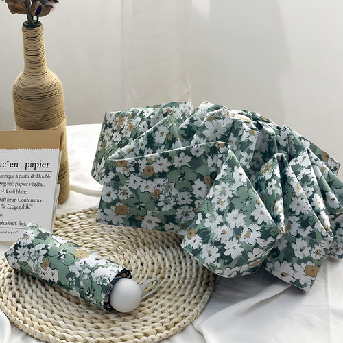 Damer Sammenleggbart paraply med elegant blomsterdesign Skanto
