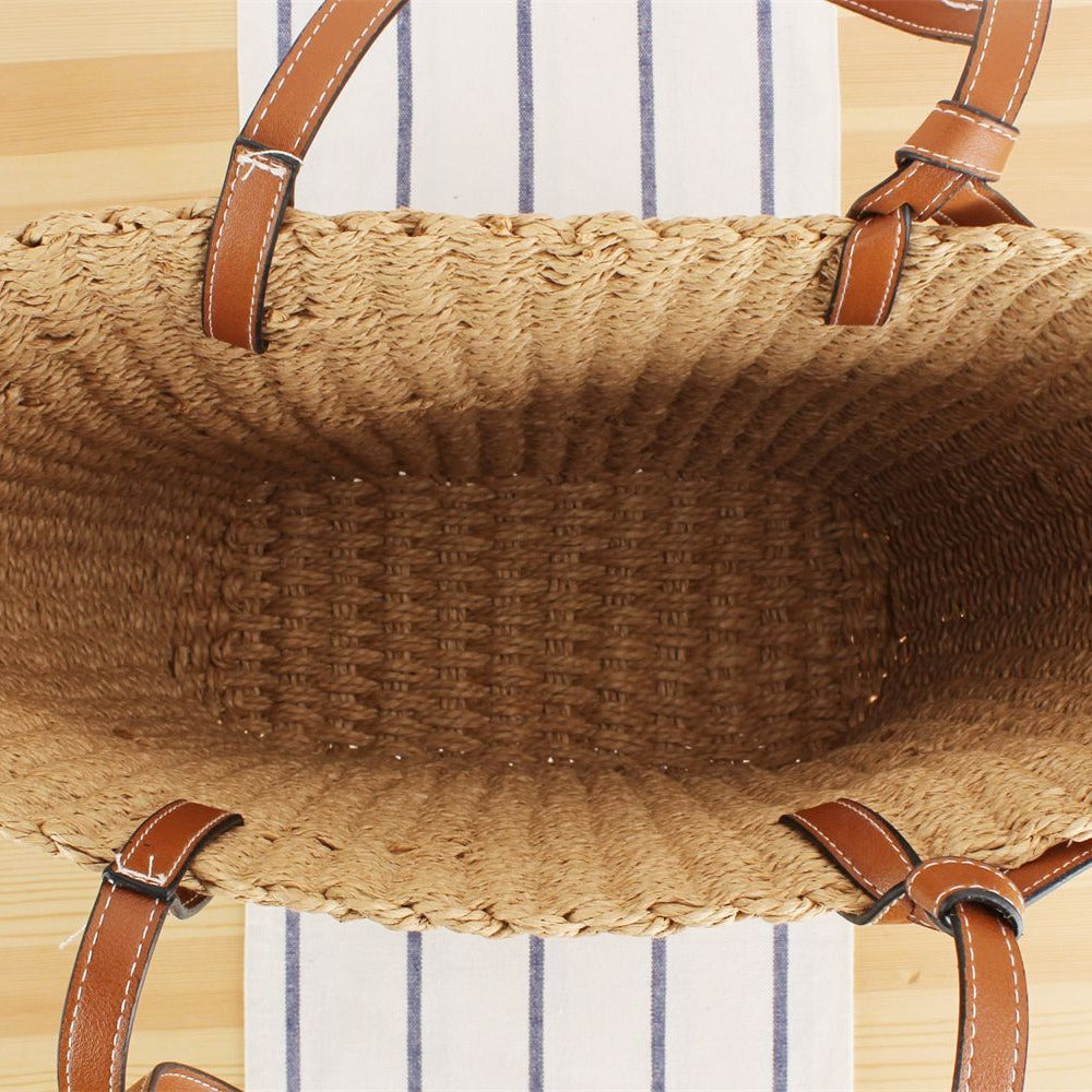 Beach bag made of hand-woven natural material with sturdy leather straps Skanto