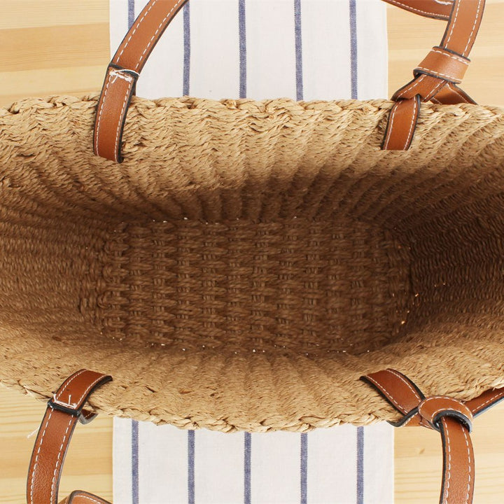 Beach bag made of hand-woven natural material with sturdy leather straps Skanto