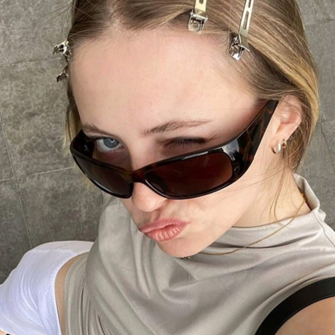 Dame solbrille i elegant retro-inspirert design Skanto