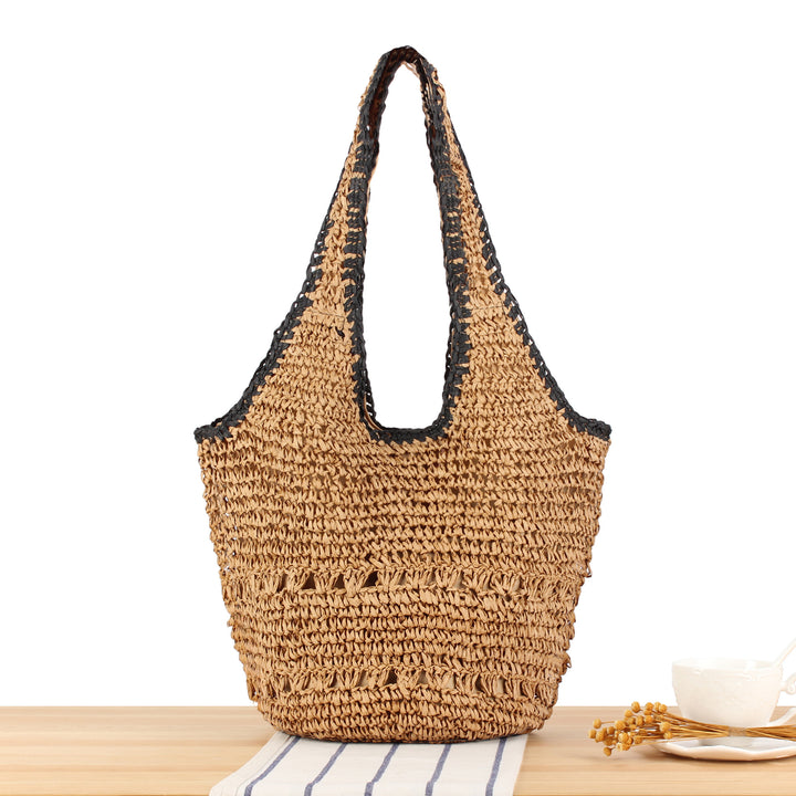 Beach shoulder bag made of hand-woven natural material with comfortable carrying handles Skanto