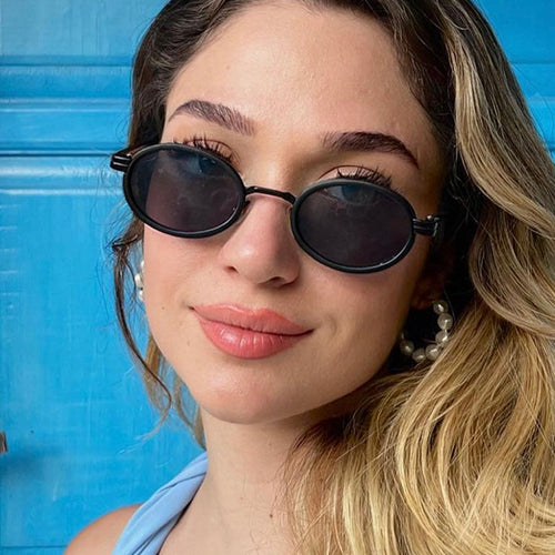 Women's round sunglasses with light lenses and golden details Skanto