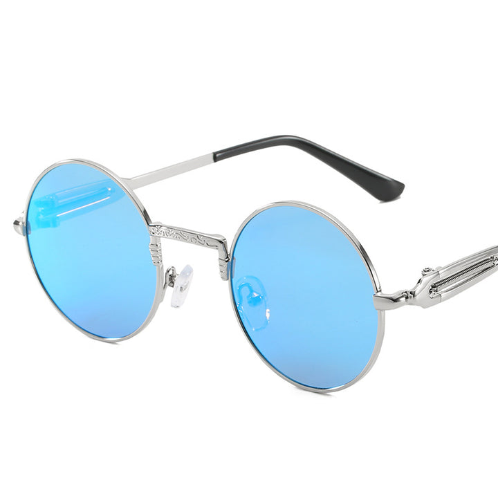 Dame rund modisk solbrille med fint metallramme Skanto