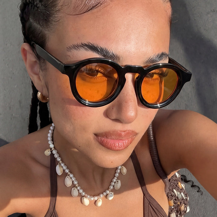 Women's fashionable round sunglasses with transparent frame and UV protection Skanto