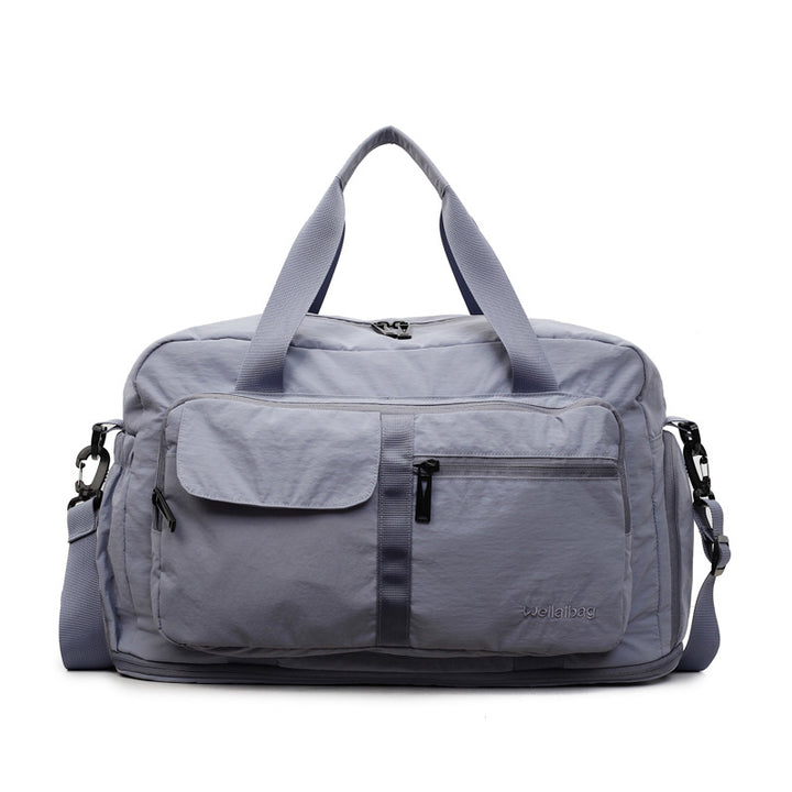 Dame Sporty Reisetask med mye lagringsplass og funksjonelt design Skanto