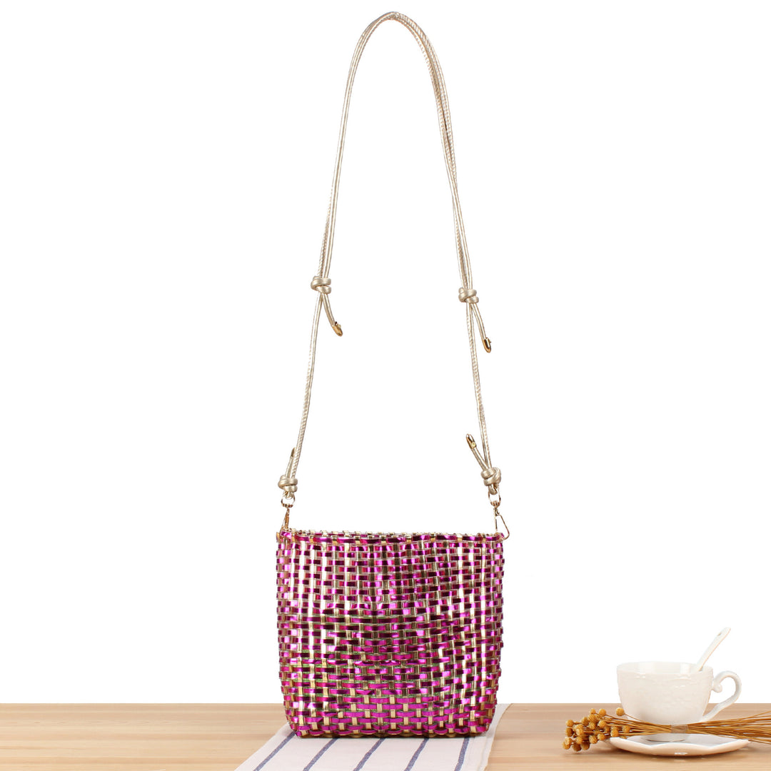 Shoulder bag made of hand-woven synthetic material with fashionable sliding mechanism Skanto