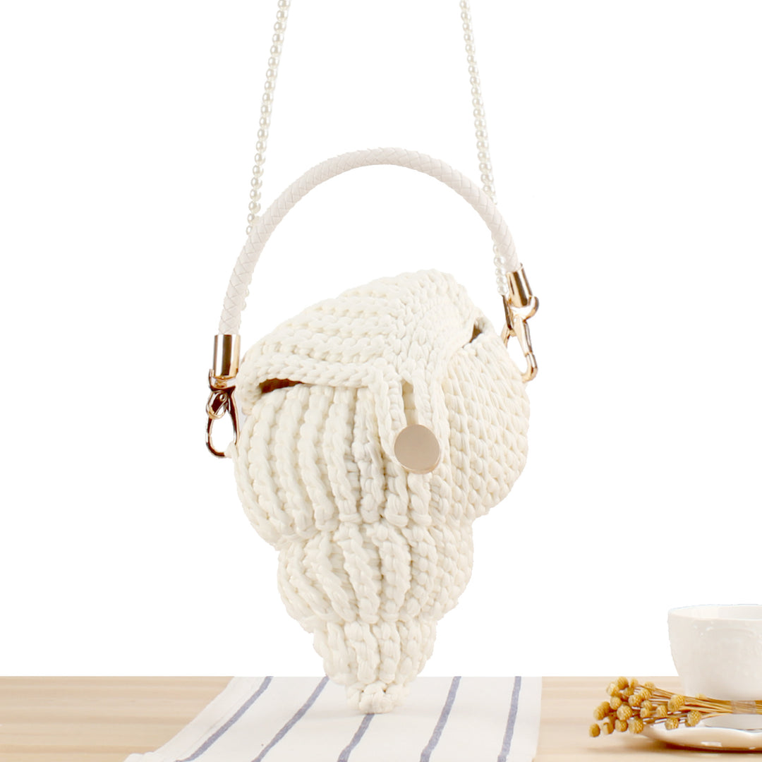 Elegant håndveske i muslingdesign Skanto