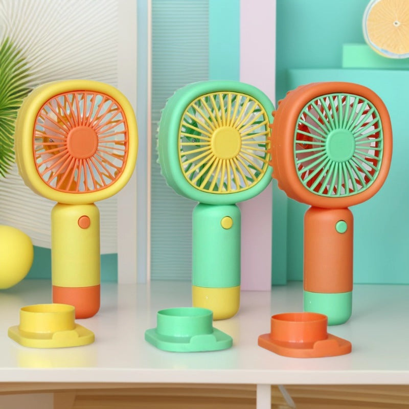 Unisex Håndholdt Vifte med ergonomisk design og praktisk ståfunksjon Skanto