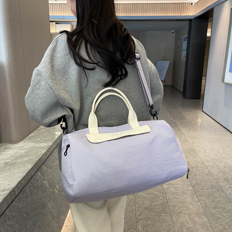 Dame Sporty reiseveske med justerbar skulderrem og elegant design Skanto