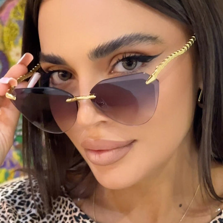 Women's Cat-Eye Sunglasses with Unique Gold Frame Design and Protective Lenses Skanto