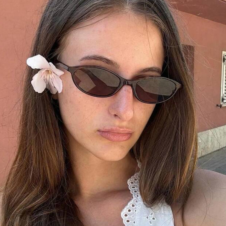 Women's oval sunglasses with transparent frame and UV protection Skanto