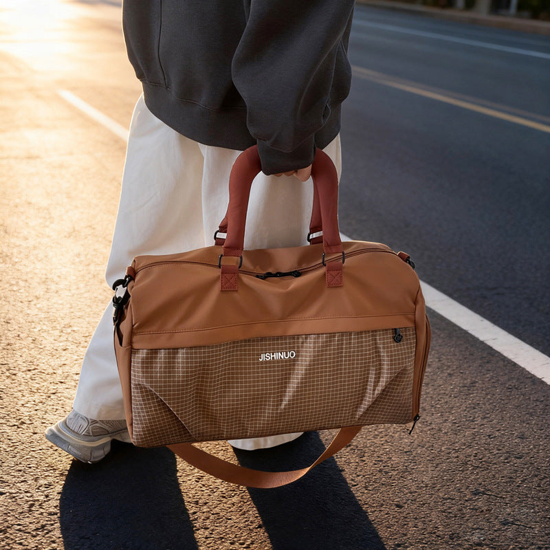 Sporty fritids-duffelbag med ergonomiske håndtak og flere rom Skanto