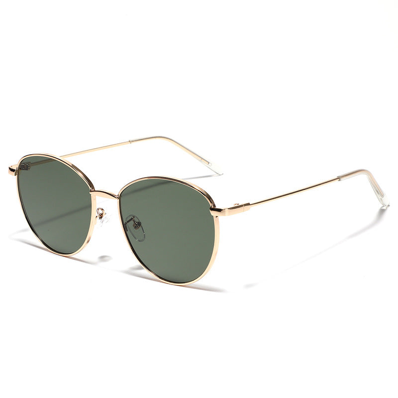 Dame rund solbrille med smal metallramme og polariserte linser Skanto