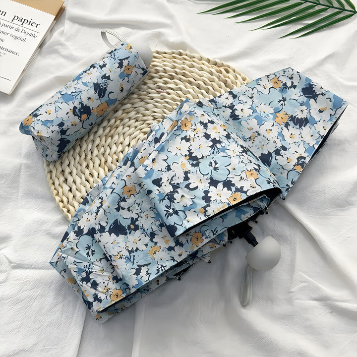 Damer Sammenleggbart paraply med elegant blomsterdesign Skanto