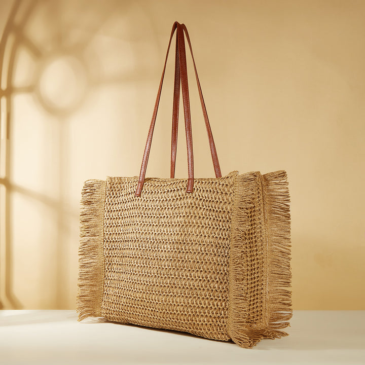 Strandveske i raffia med frynse-detaljer Skanto