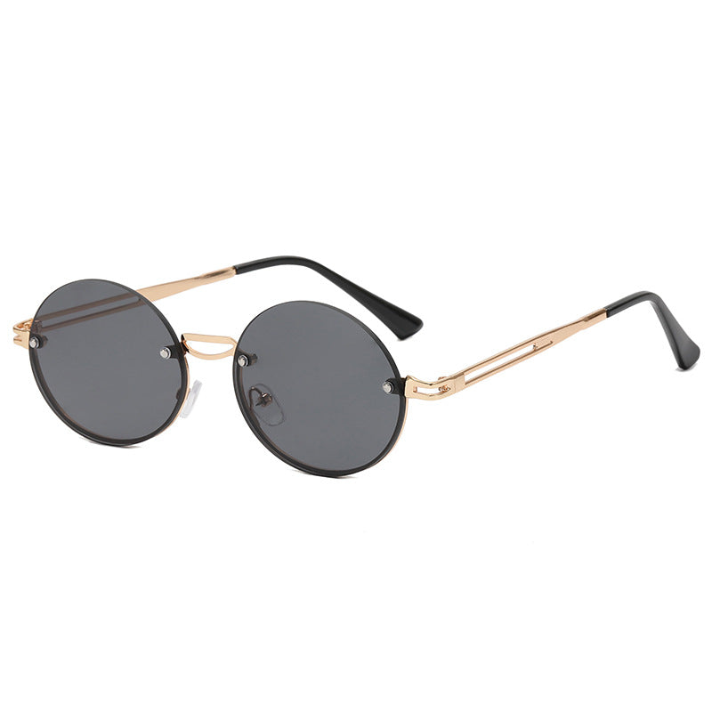 Dame rund solbrille med fin metallramme Skanto