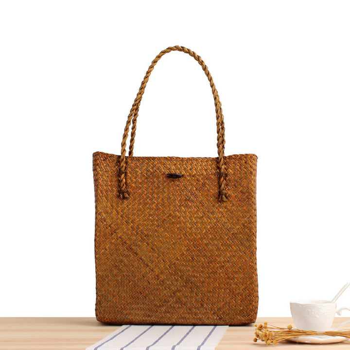 Hand-knotted tote bag in natural weave Skanto
