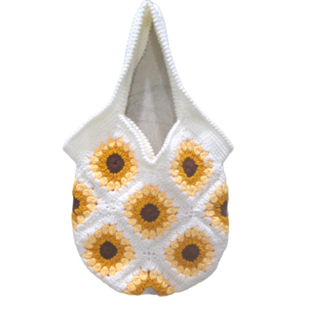 Håndlaget makramee-veske med solblomstmotiv Skanto