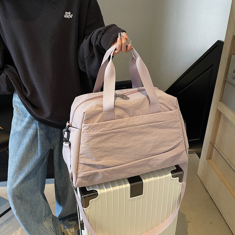Elegant og romslig sport crossover bag Skanto