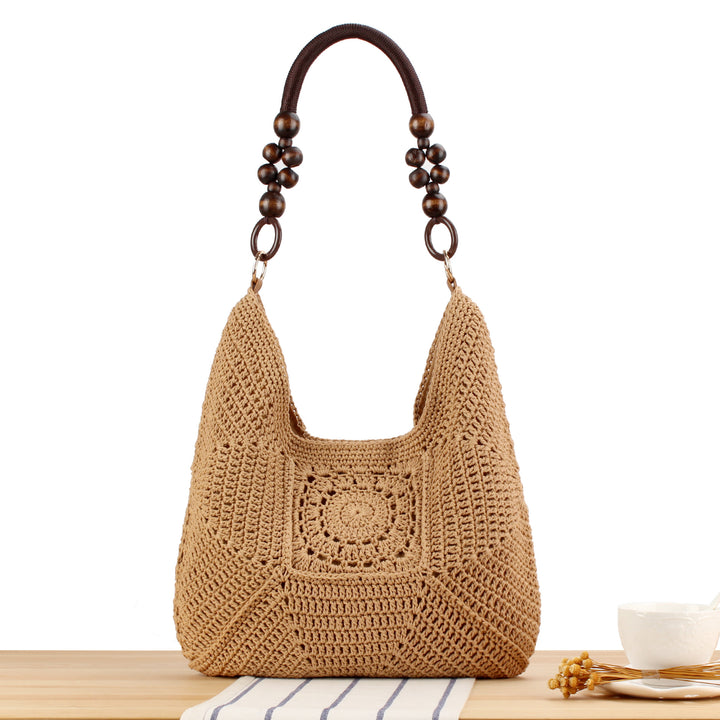 Handbag made of hand-knotted natural material with stylish wooden handles Skanto
