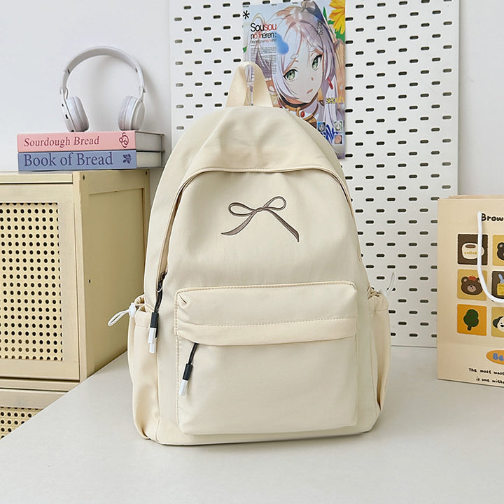 Minimalist bue-smokket skole ryggsekk