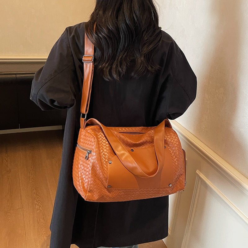 Elegant sports duffel bag with woven design and removable shoulder strap Skanto