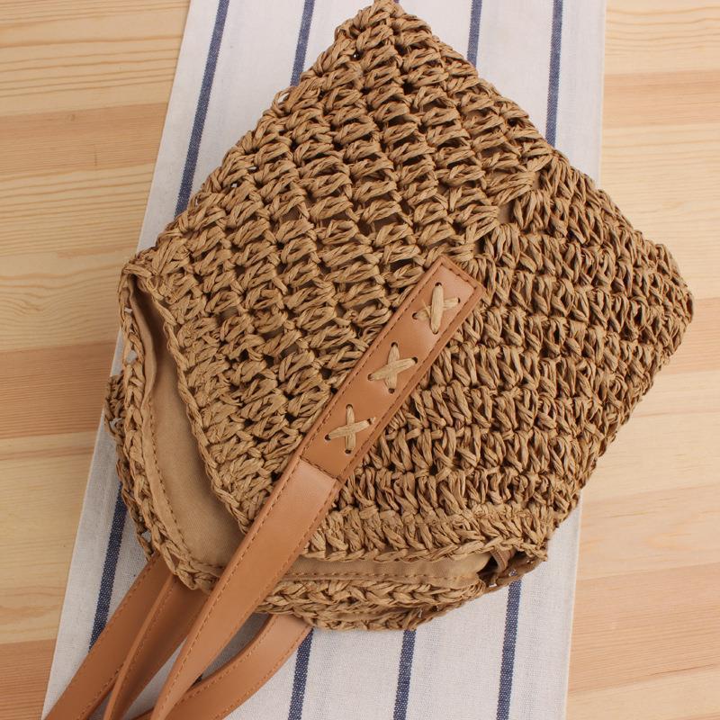 Large straw bag with leather accents Skanto