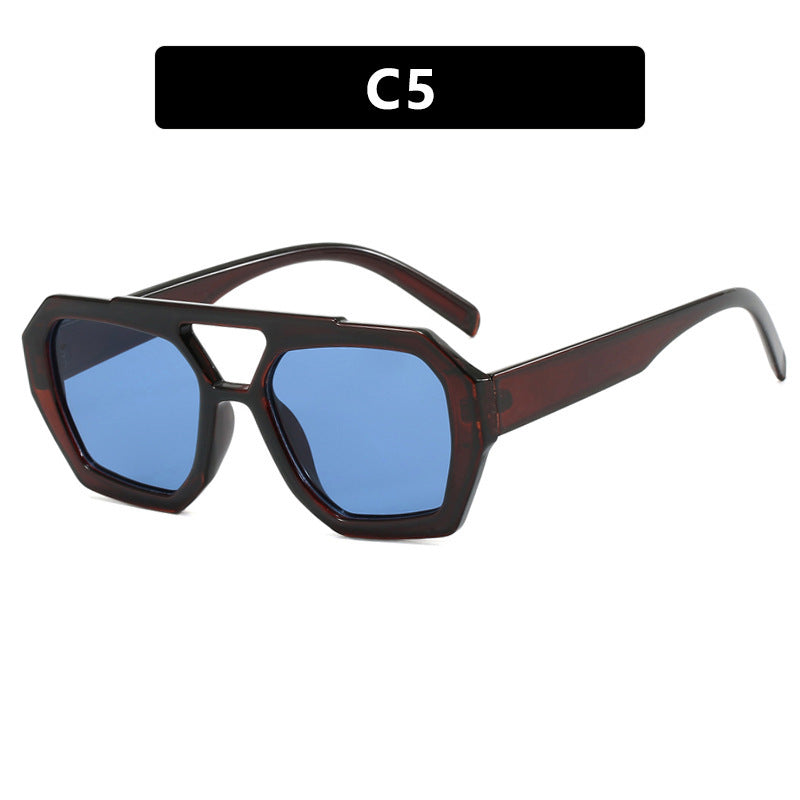 Dame oversized solbrille i markant, åttkantet design Skanto