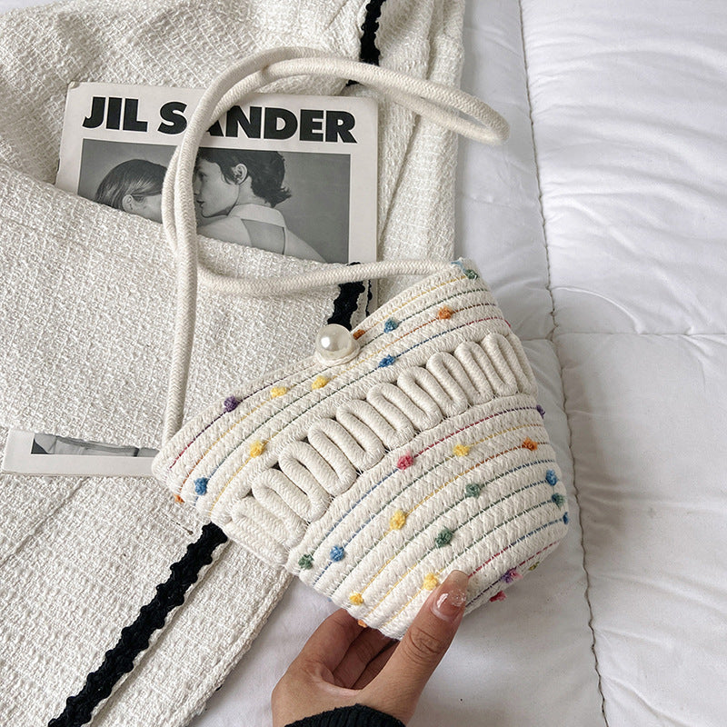 Playful handbag made of braided material Skanto