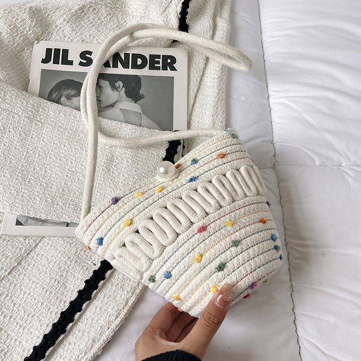Playful handbag made of braided material Skanto