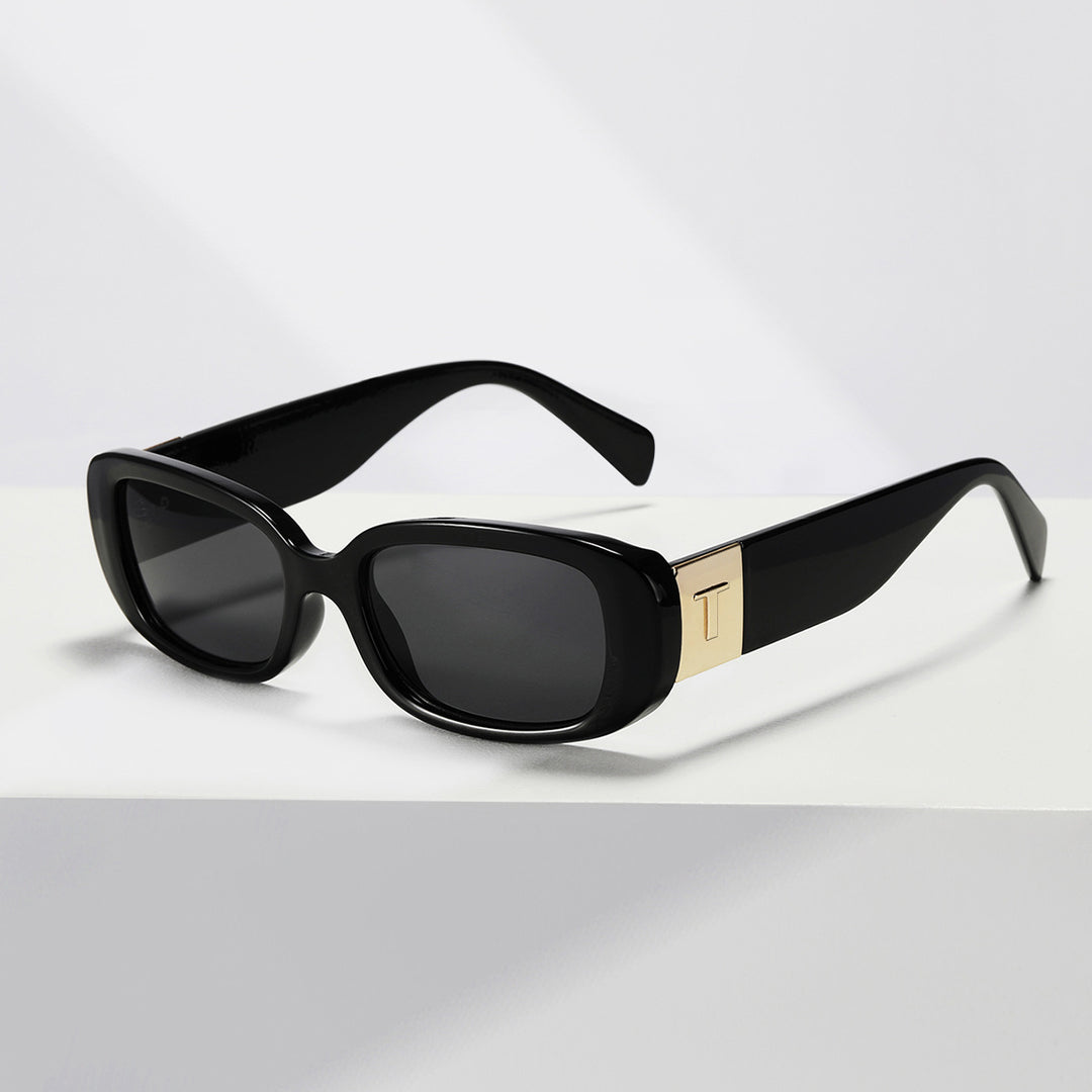 Dame solbrille med moderne ramme og høykvalitets UV-beskyttelse Skanto
