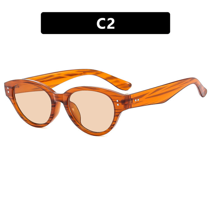 Dame Cat-Eye solbriller i elegant design med bred ramme Skanto