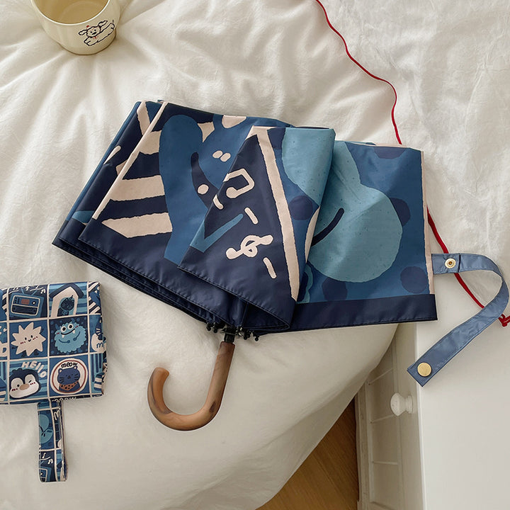 Dame sammenleggbare paraply med kreativt geometrisk design Skanto