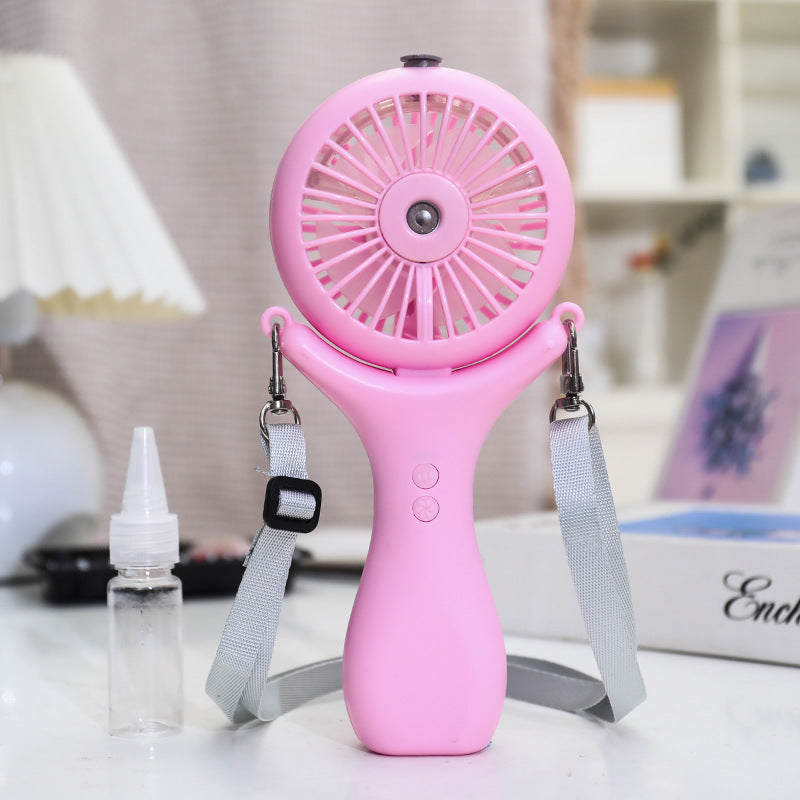 Dame bærbar håndvifte med ergonomisk design og sprayfunksjon Skanto