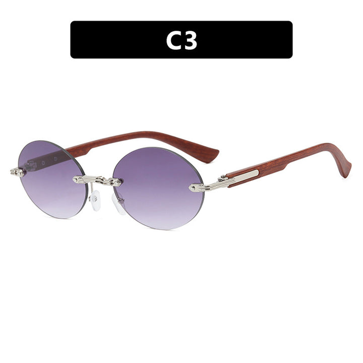 Dame rund solbrille med elegant treinnramme og UV-beskyttelse Skanto